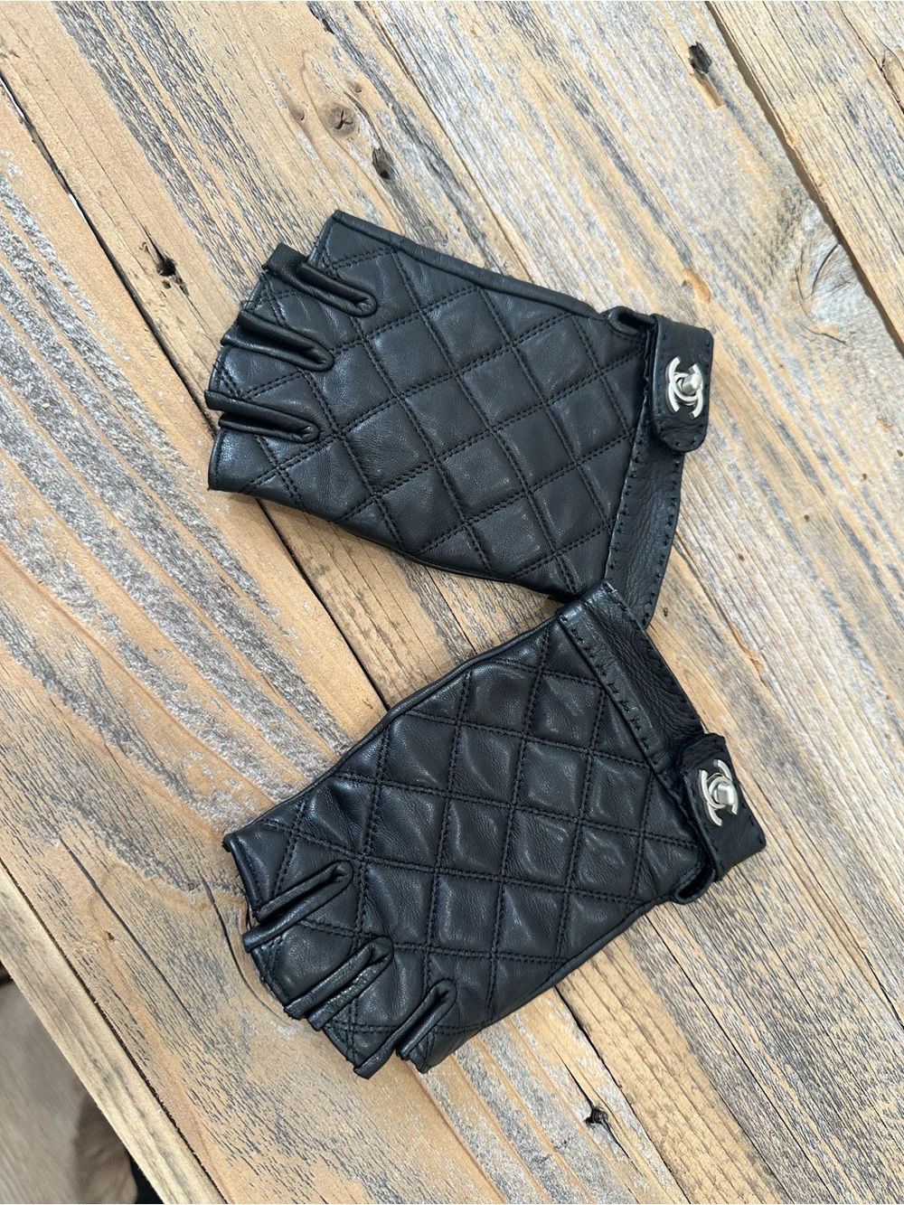 CHANEL Black Quilted Fingerless Leather Gloves with CC Snap